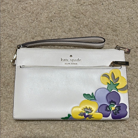 NWOB Kate Spade Beige Wristlet with Yellow and Purple Pansy Design - Picture 1 of 4